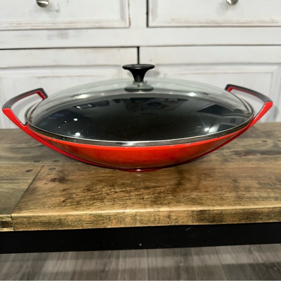 Le Creuset Cherry Red Cast Iron wok with glass lid.